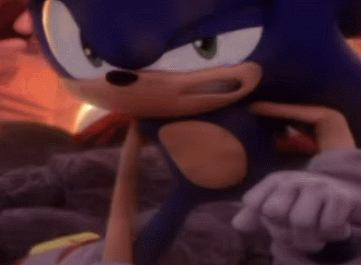Sonic falls down. Shadow is behind him, holding a gun. From the videogame Shadow the Hedgehog from 2005